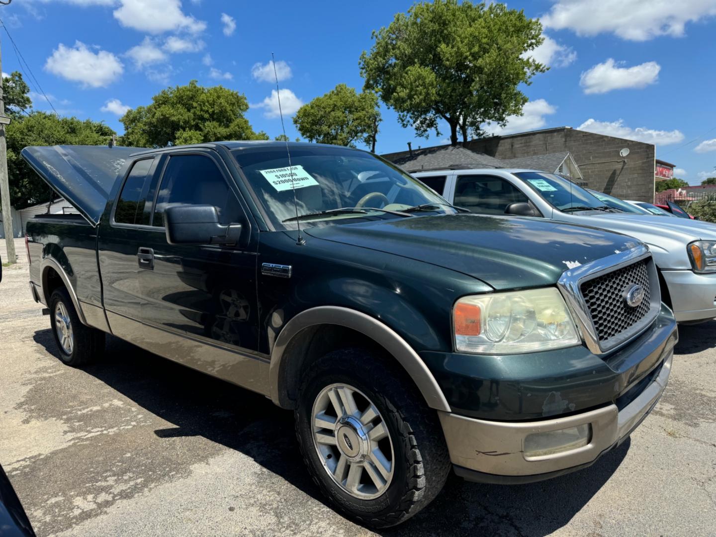 2004 Green Ford F-150 Lariat SuperCab 2WD (1FTPX12504N) with an 5.4L V6 SOHC 16V engine, Automatic transmission, located at 3624 Hemphill St., Fort Worth, TX, 76110, (817) 926-8921, 32.696205, -97.331985 - Photo#0