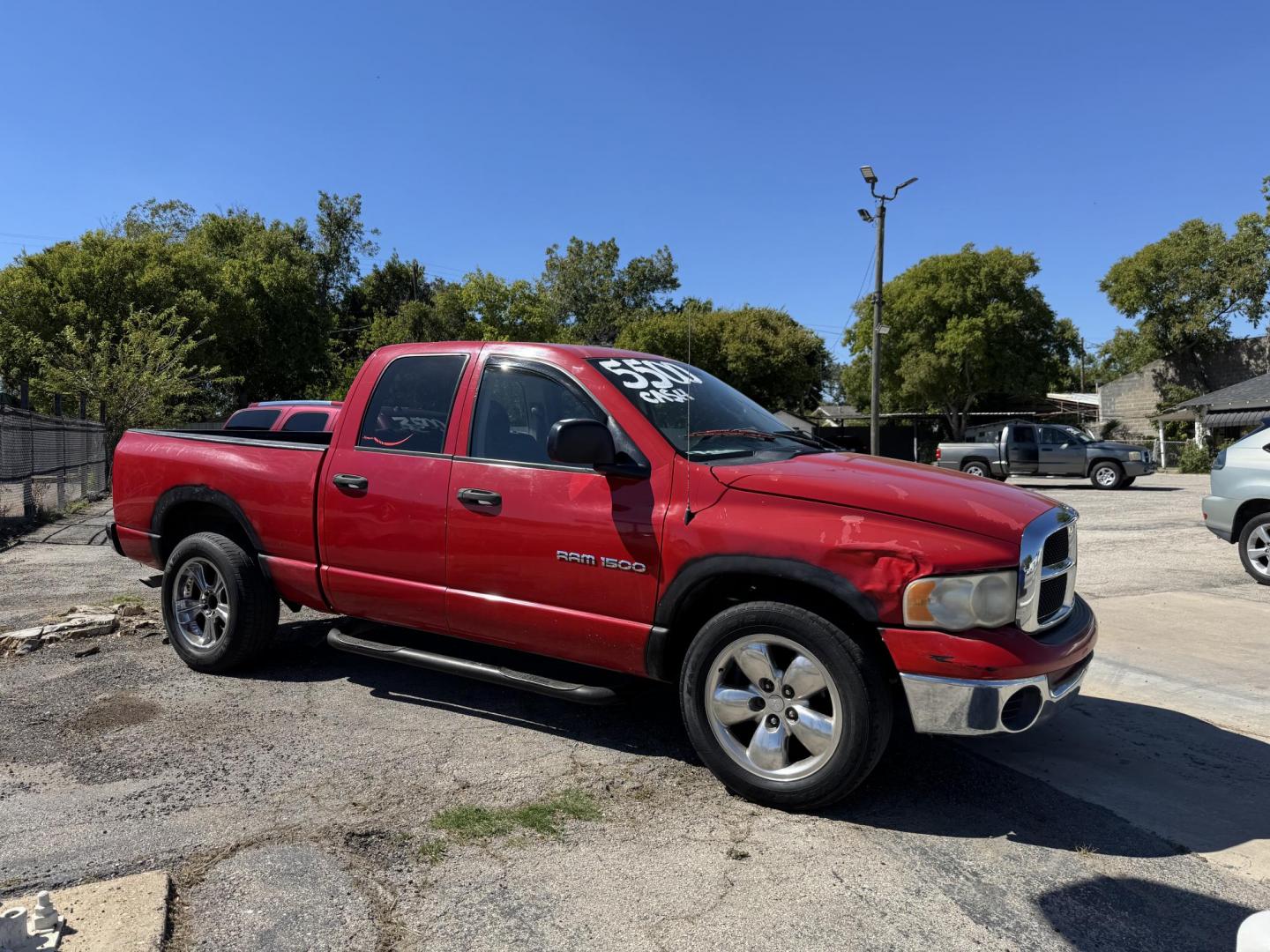 2004 Red Dodge Ram 1500 Laramie Quad Cab 2WD (1D7HA18N54S) with an 4.7L V8 SOHC 16V engine, Automatic transmission, located at 3624 Hemphill St., Fort Worth, TX, 76110, (817) 926-8921, 32.696205, -97.331985 - Photo#0