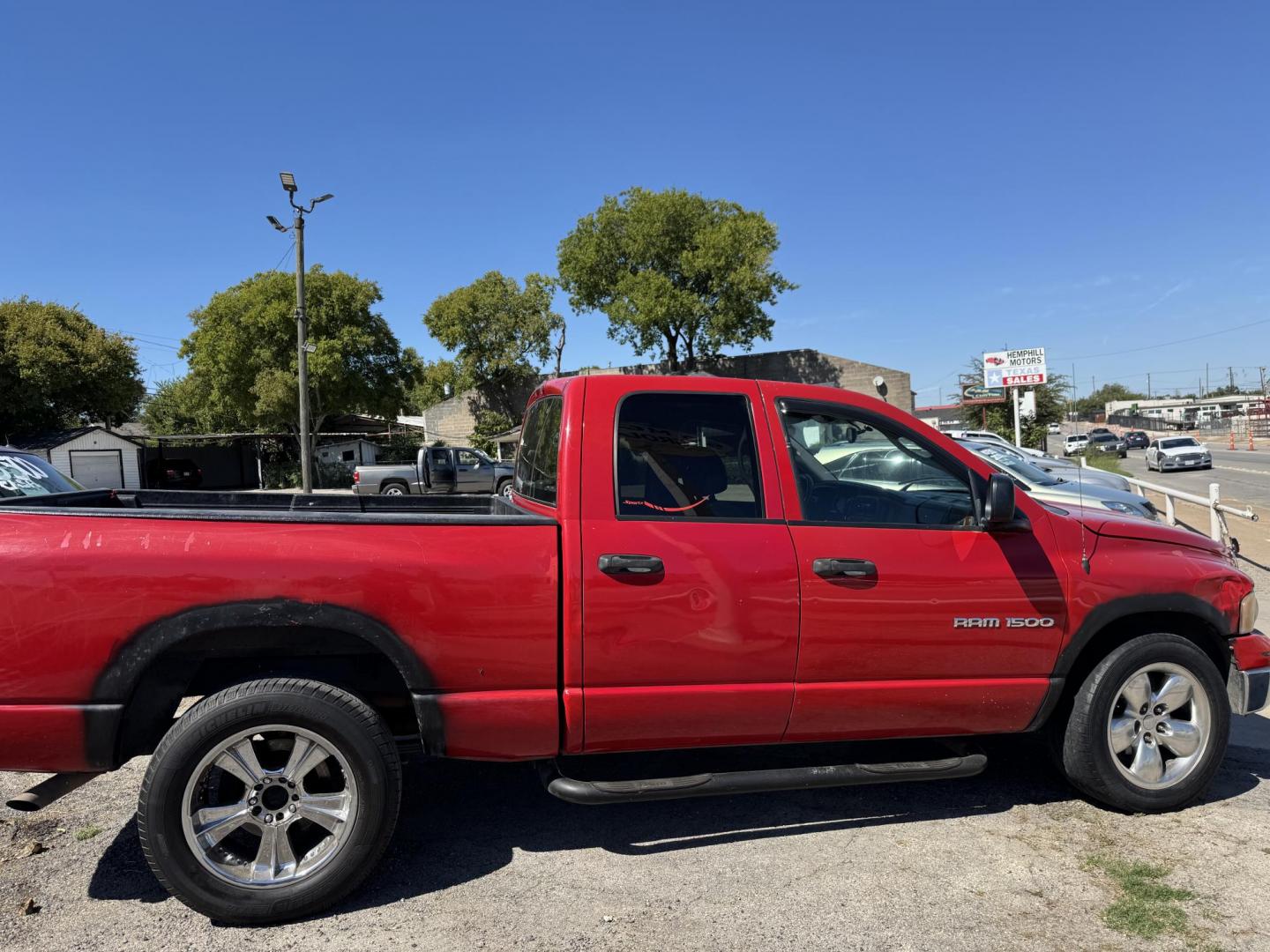 2004 Red Dodge Ram 1500 Laramie Quad Cab 2WD (1D7HA18N54S) with an 4.7L V8 SOHC 16V engine, Automatic transmission, located at 3624 Hemphill St., Fort Worth, TX, 76110, (817) 926-8921, 32.696205, -97.331985 - Photo#3