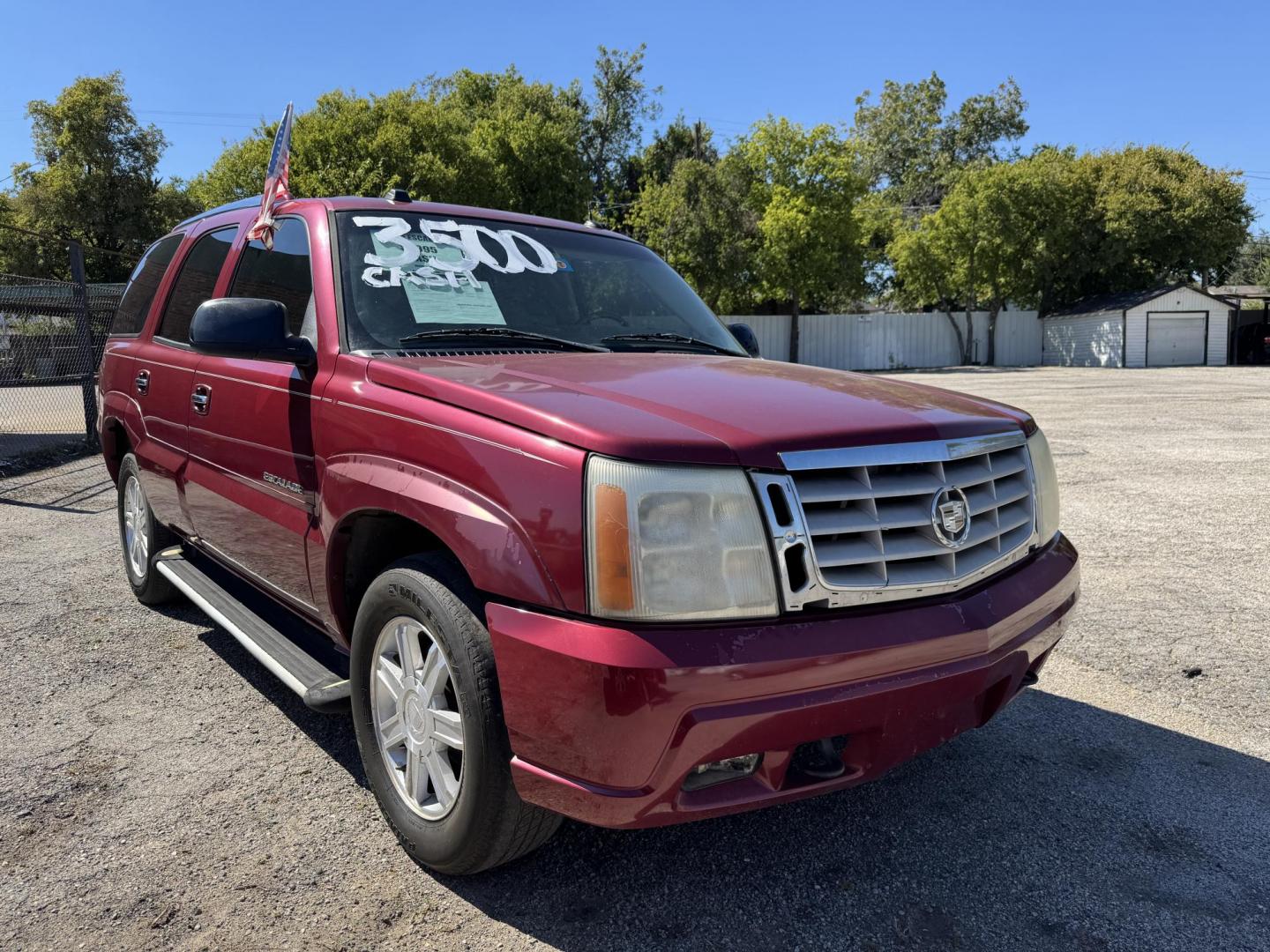 2005 Maroon Cadillac Escalade 2WD (1GYEC63N95R) with an 6.0L V8 OHV 16V engine, Automatic transmission, located at 3624 Hemphill St., Fort Worth, TX, 76110, (817) 926-8921, 32.696205, -97.331985 - Photo#0