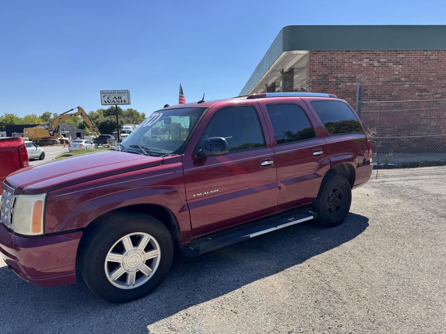 2005 Maroon Cadillac Escalade 2WD (1GYEC63N95R) with an 6.0L V8 OHV 16V engine, Automatic transmission, located at 3624 Hemphill St., Fort Worth, TX, 76110, (817) 926-8921, 32.696205, -97.331985 - Photo#1