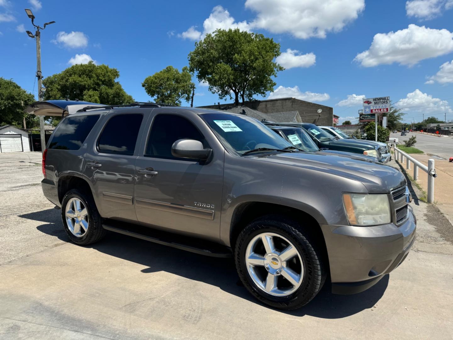 2009 Tan Chevrolet Tahoe LTZ 2WD (1GNFC33J99R) with an 5.3L V8 OHV 16V engine, Automatic transmission, located at 3624 Hemphill St., Fort Worth, TX, 76110, (817) 926-8921, 32.696205, -97.331985 - Photo#0