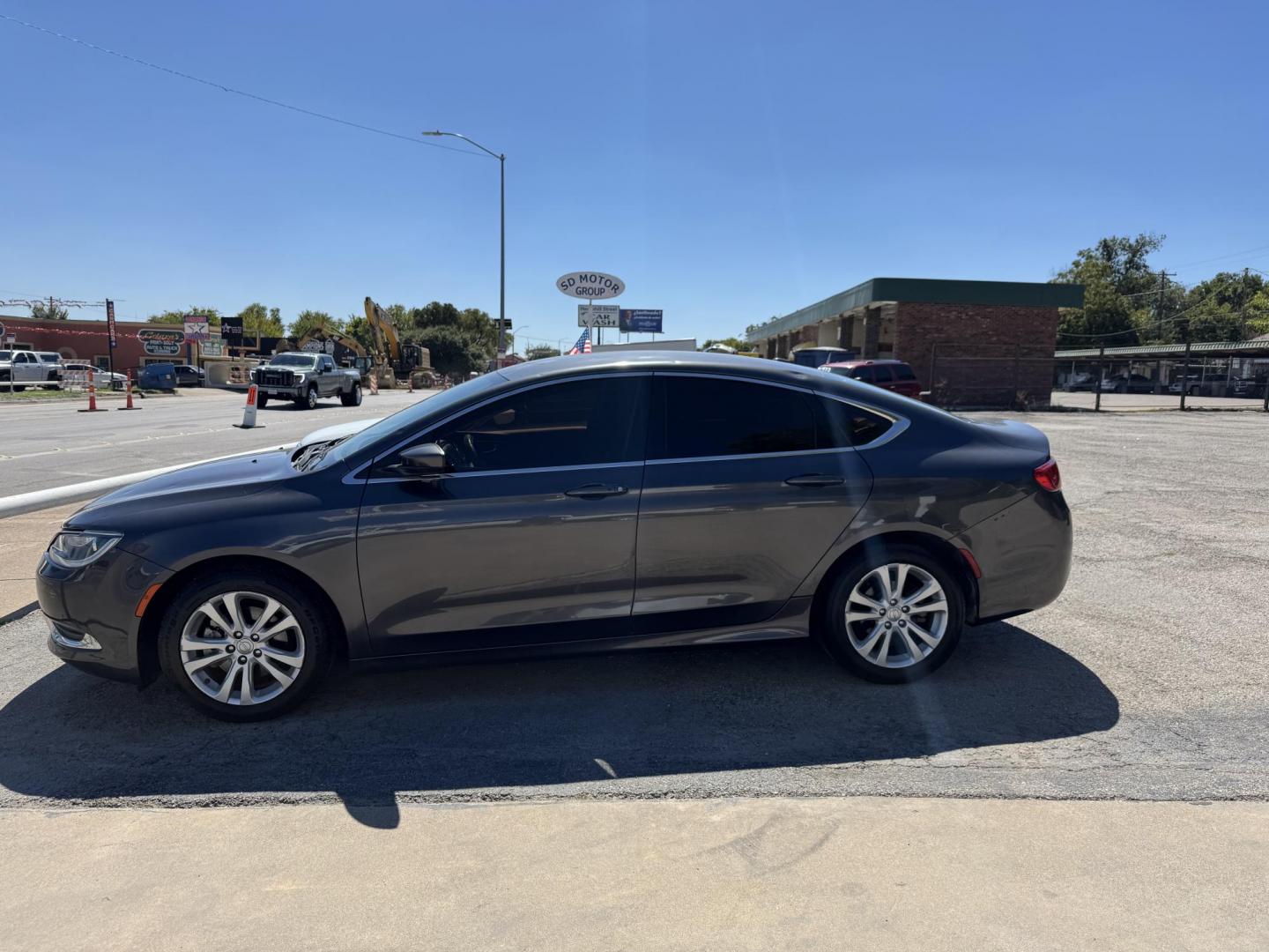 2015 Gray Chrysler 200 Limited (1C3CCCAB6FN) with an 2.4L L4 DOHC 16V engine, 9-Speed Automatic transmission, located at 3624 Hemphill St., Fort Worth, TX, 76110, (817) 926-8921, 32.696205, -97.331985 - Photo#1