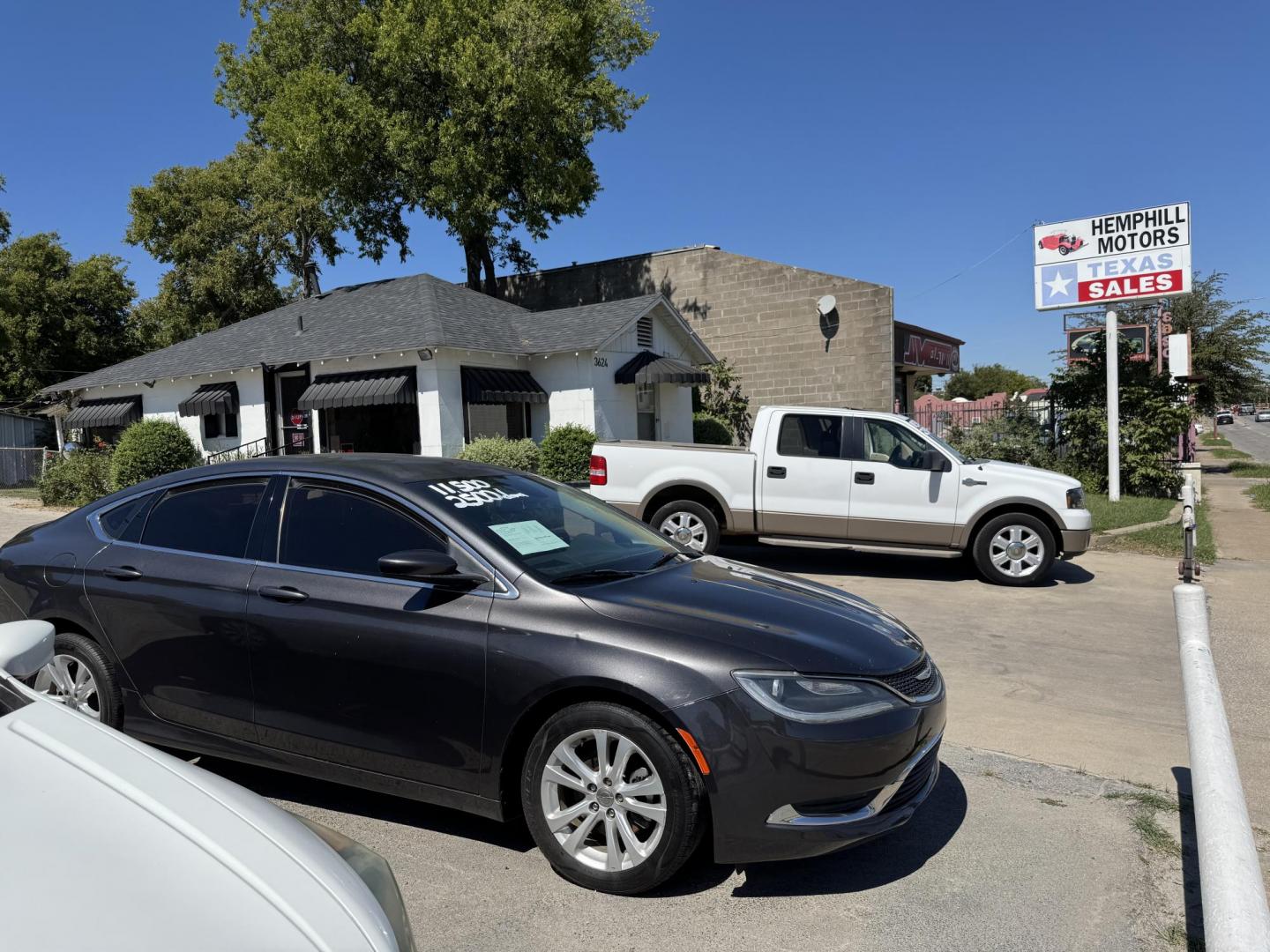 2015 Gray Chrysler 200 Limited (1C3CCCAB6FN) with an 2.4L L4 DOHC 16V engine, 9-Speed Automatic transmission, located at 3624 Hemphill St., Fort Worth, TX, 76110, (817) 926-8921, 32.696205, -97.331985 - Photo#2