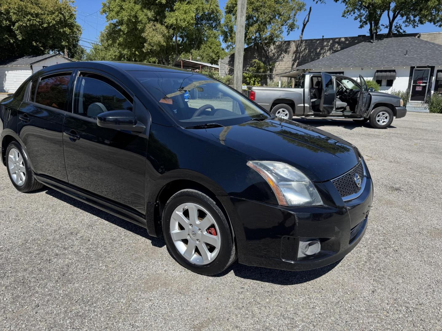 2012 Black Nissan Sentra 2.0 (3N1AB6AP7CL) with an 2.0L L4 DOHC 16V engine, Automatic transmission, located at 3624 Hemphill St., Fort Worth, TX, 76110, (817) 926-8921, 32.696205, -97.331985 - Photo#3