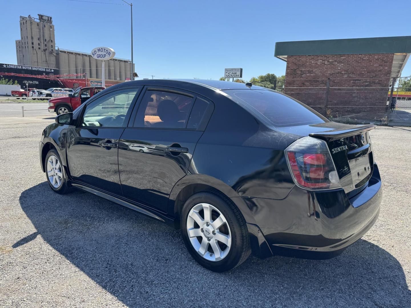 2012 Black Nissan Sentra 2.0 (3N1AB6AP7CL) with an 2.0L L4 DOHC 16V engine, Automatic transmission, located at 3624 Hemphill St., Fort Worth, TX, 76110, (817) 926-8921, 32.696205, -97.331985 - Photo#5